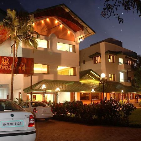 Hotel Woodland Kolhapur Bagian luar foto