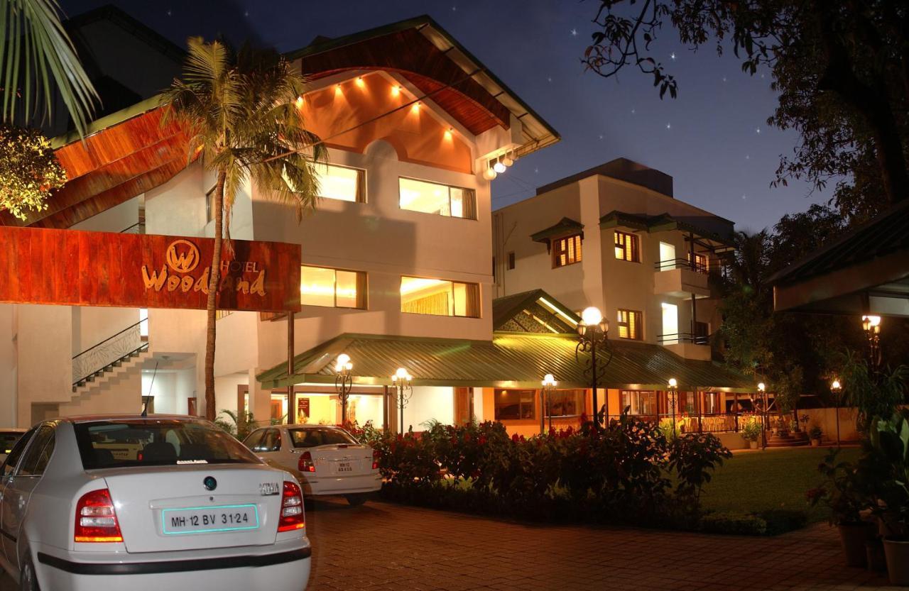Hotel Woodland Kolhapur Bagian luar foto
