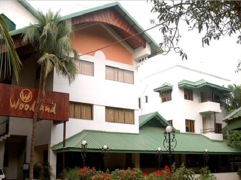 Hotel Woodland Kolhapur Bagian luar foto