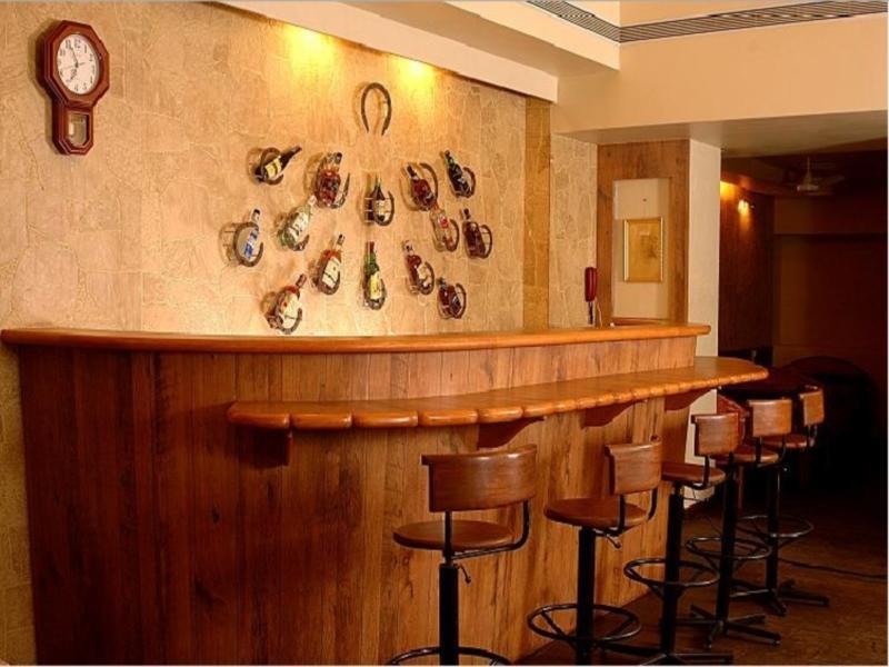 Hotel Woodland Kolhapur Bagian luar foto